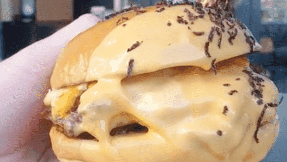 Burgers Dipped In Cheese Sauce