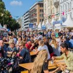 people sitting at table at malmo food festival