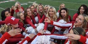 american cheerleaders at college football game