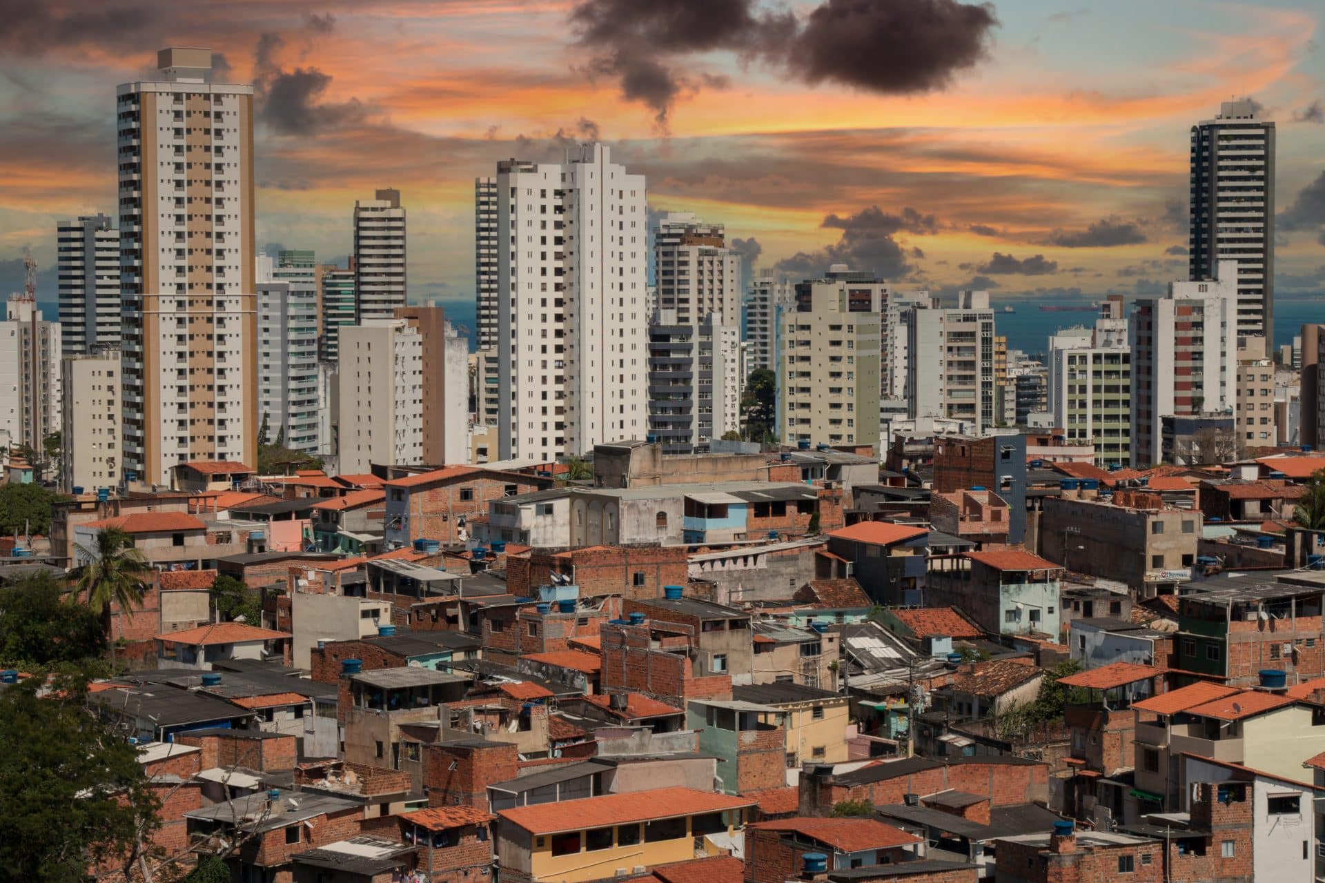 favela in front of high rise buildings in rio de janeiro