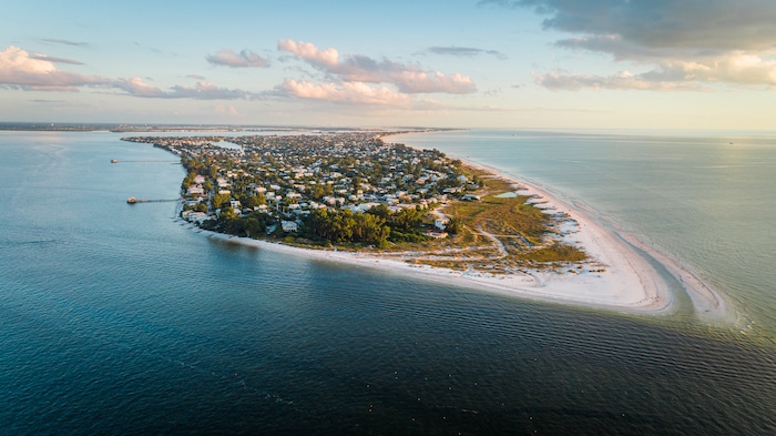 "Anna Maria Island, FL / USA - 11-14-2020: Aerial shot of Bean Point Beach in Anna Maria Island."