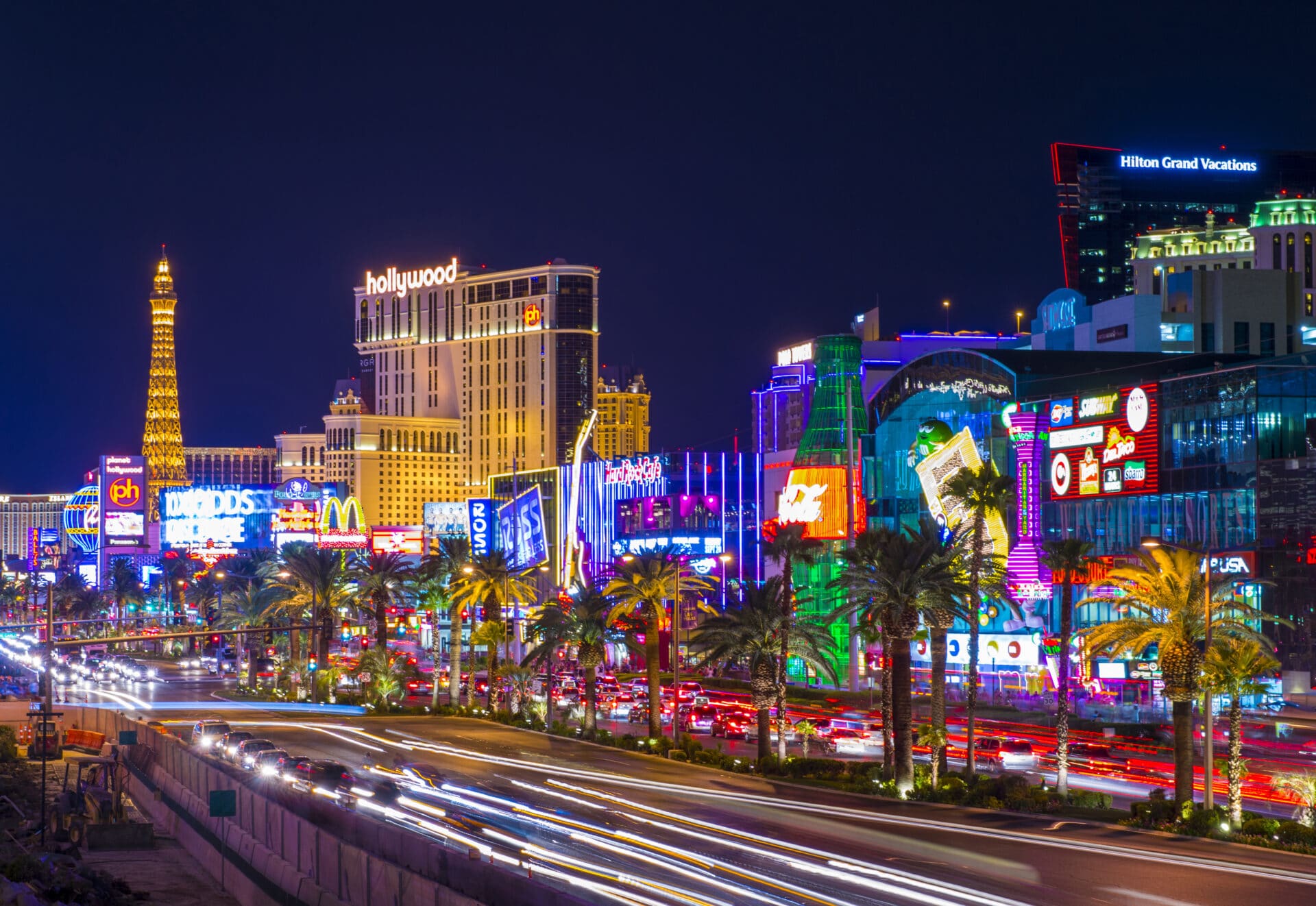 neon lights and lit up buildings along las vegas strip