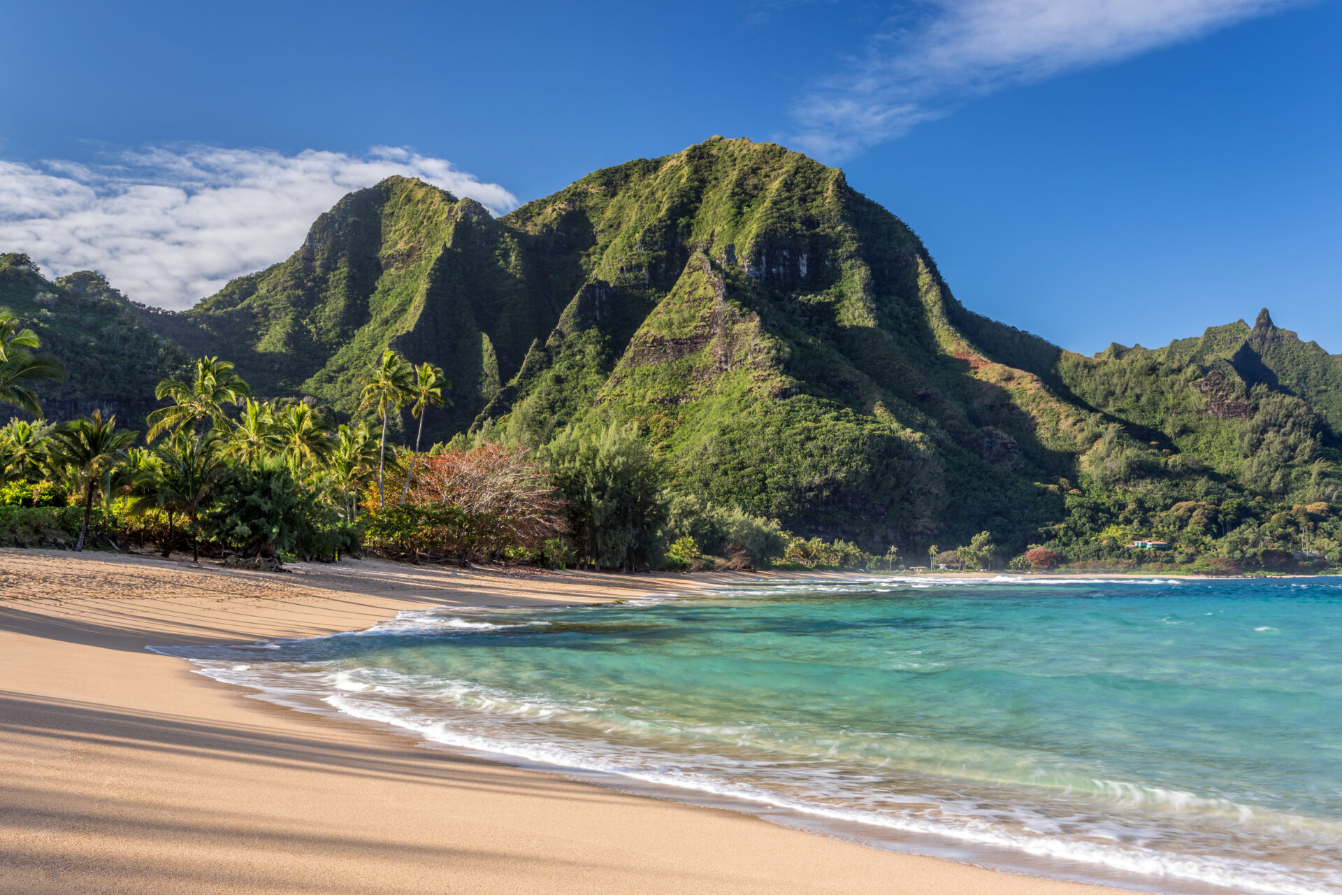 turqouise waters lap onto white sand beach