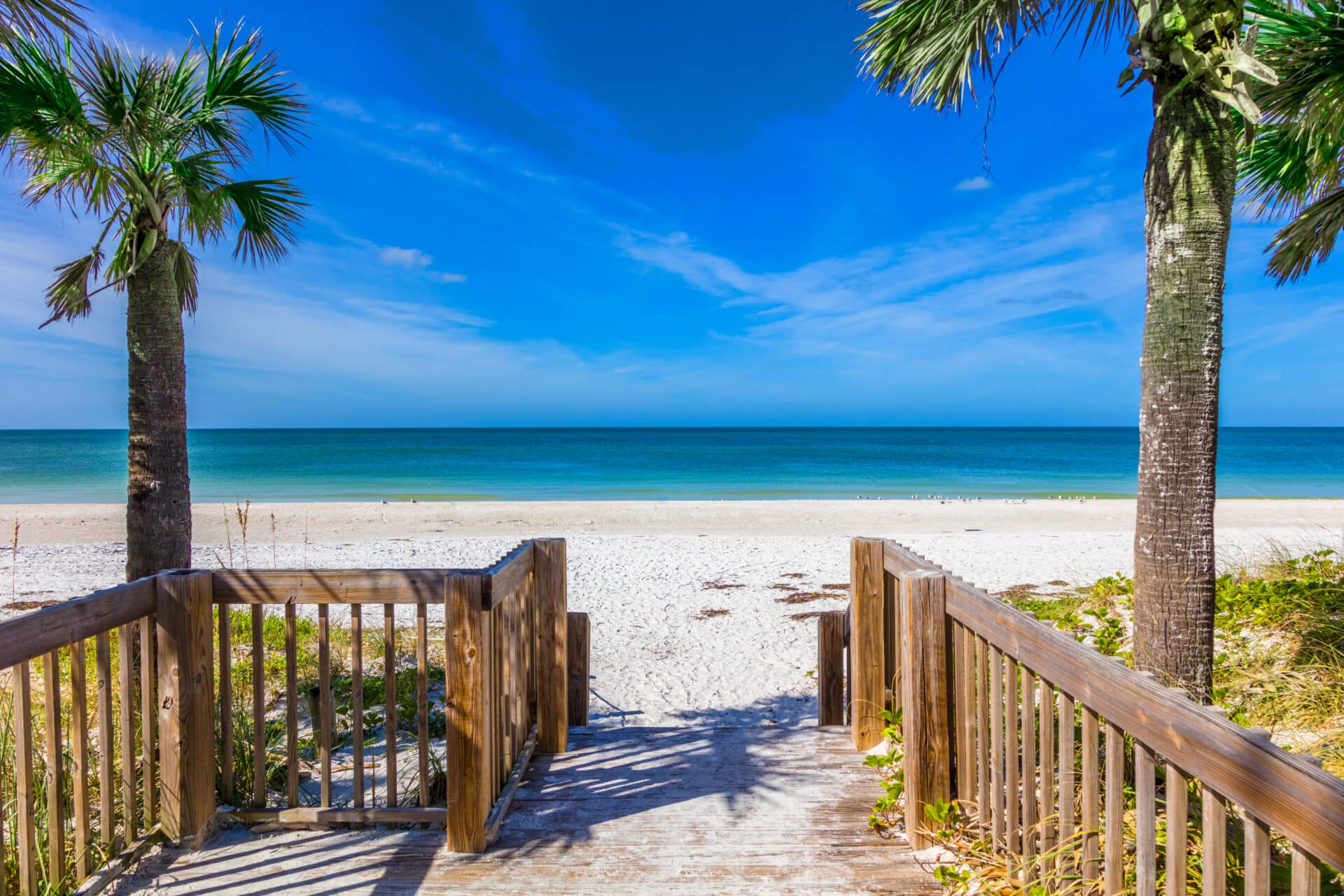 walkway to white sand beach