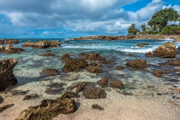 Scenic landscape of Sharks Cove, Hawaii, a small rocky bay side of Pupukea Beach Park. Sharks Cove is a popular snorkeling site on Oahu, North Shore, and boasts an impressive amount of sea life.
